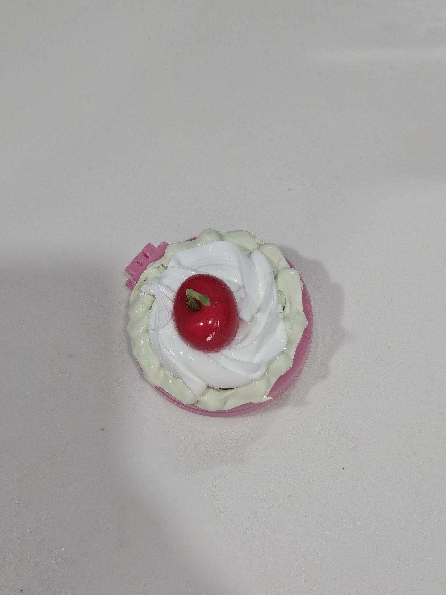White cake compact mirror